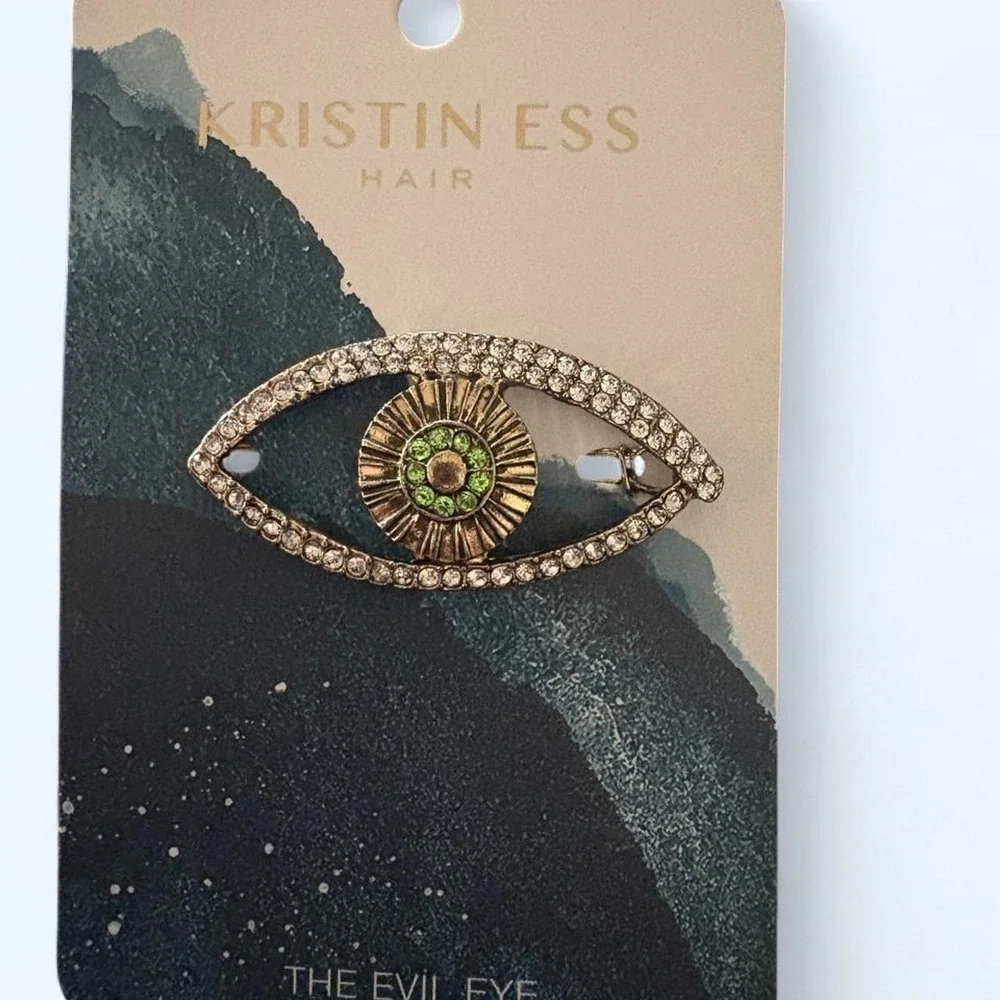Kristin Ess Evil Eye Hair Clip with green gemstone center and gold detailing